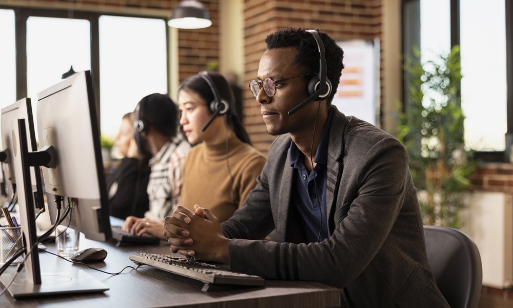 Customer support team attending to customer calls.